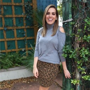 Grey turtle neck with cut out shoulder details